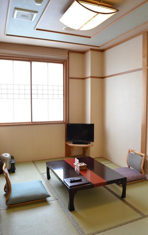 Akita Onsen Plaza Hotel Habitación foto